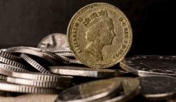 Economía de Reino Unido se contrajo más de lo previsto
