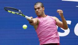 Carlos Alcaraz tira de arte para superar a un duro Rinderknech y meterse en cuartos de final del US Open 2025