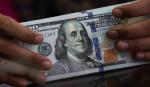 Cotización del dólar oficial desciende tres centavos este martes
